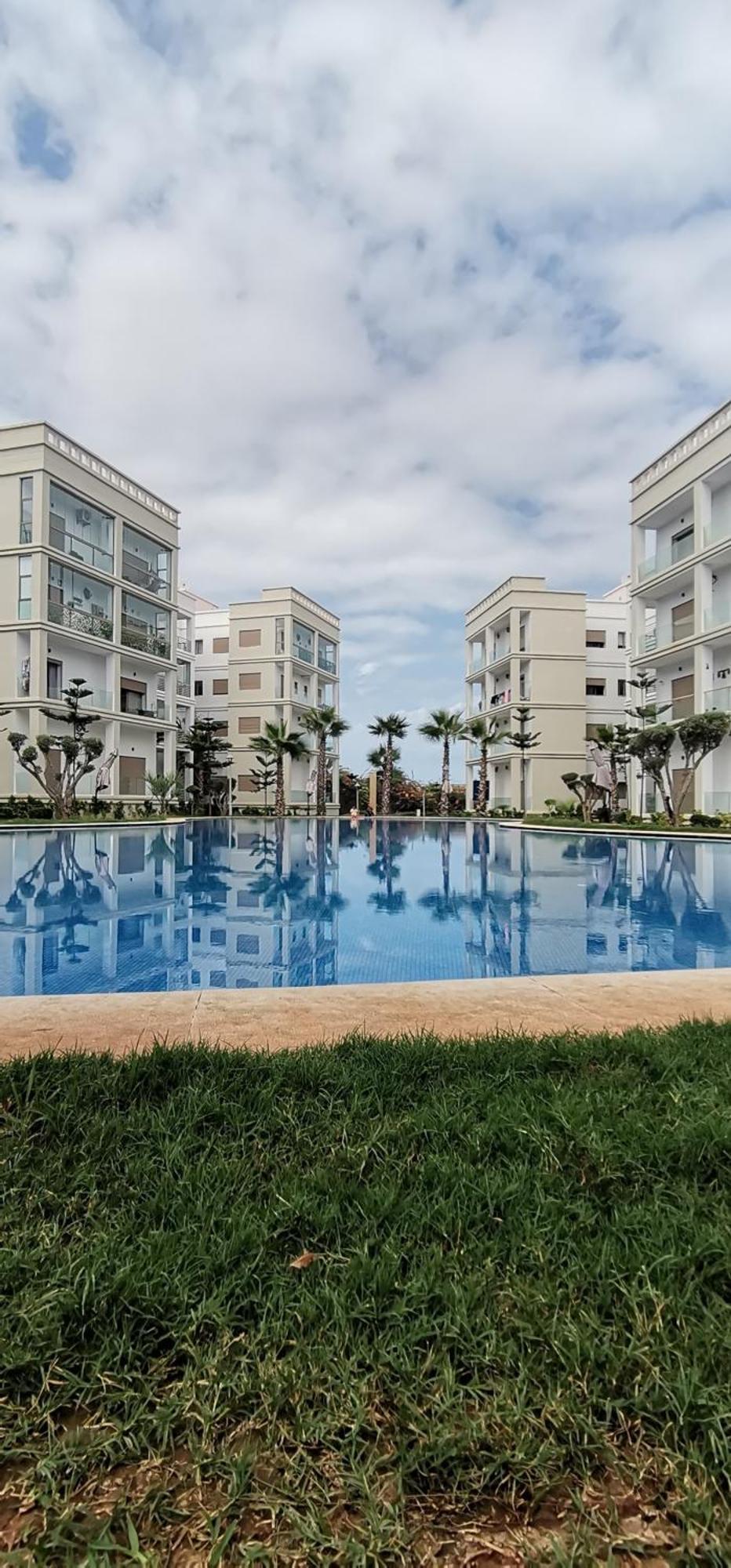 Grand Appartement Vue Golf A 2 Min De La Plage Bouznika Bagian luar foto